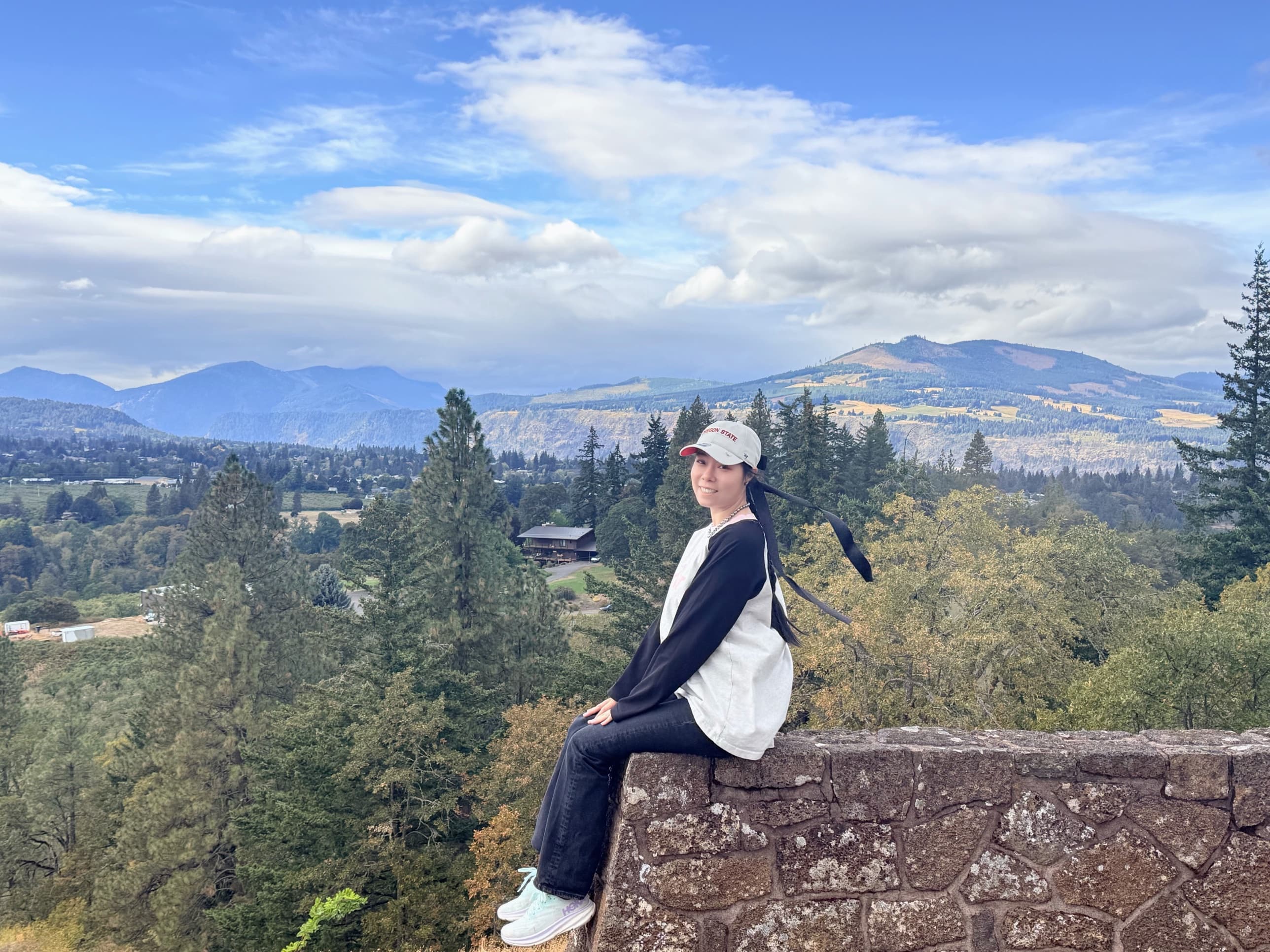 Sitting on the stone wall above the Hood River Valley