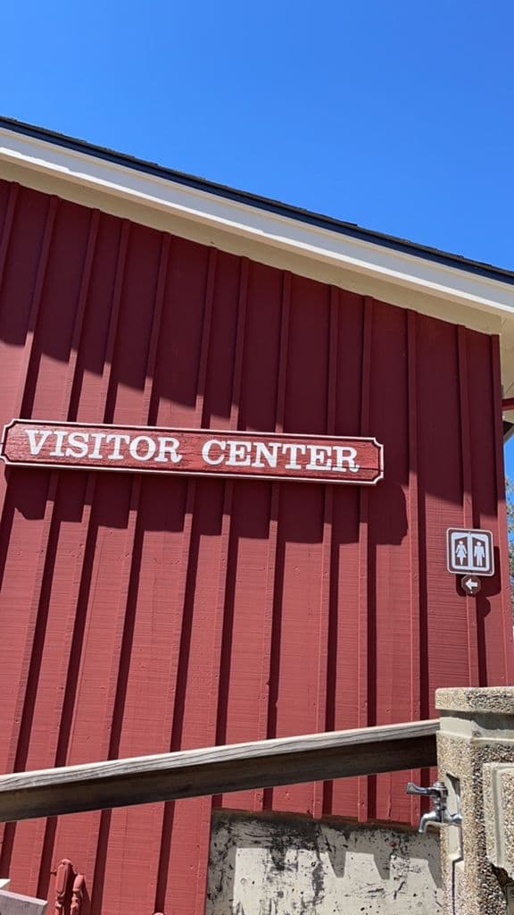Henry Coe visitor center sign on a red building